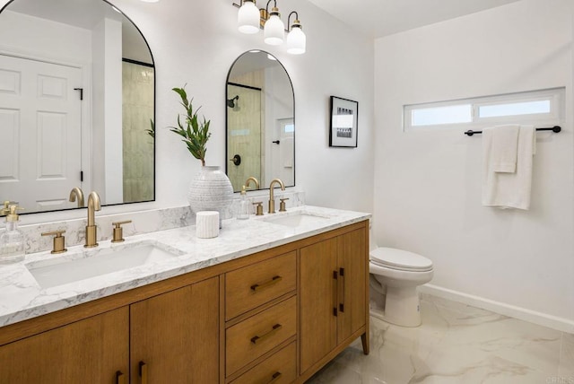 bathroom with a sink, a shower, toilet, and marble finish floor