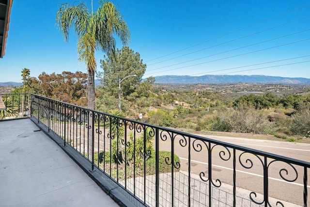 balcony featuring a mountain view