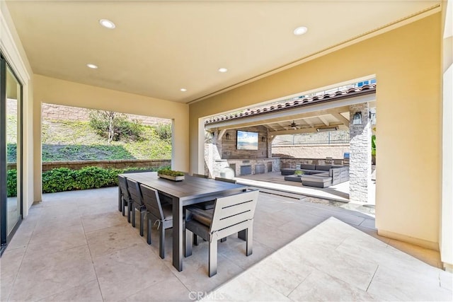 view of patio / terrace featuring outdoor dining space, a gazebo, and an outdoor living space with a fireplace