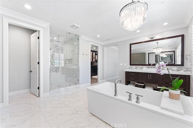 full bathroom with visible vents, a soaking tub, a stall shower, marble finish floor, and a chandelier