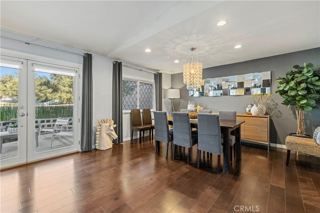 dining space featuring recessed lighting, a chandelier, baseboards, and dark wood finished floors