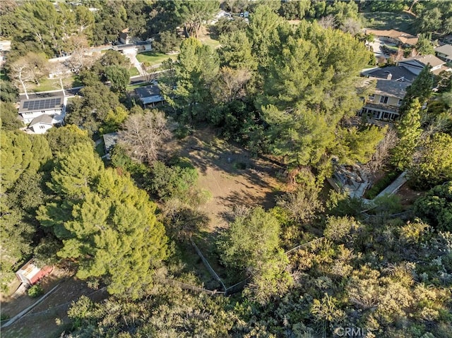 aerial view featuring a view of trees