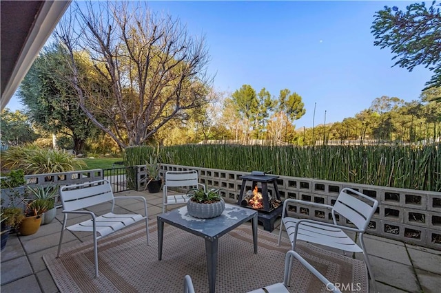 wooden deck featuring an outdoor hangout area and a patio area