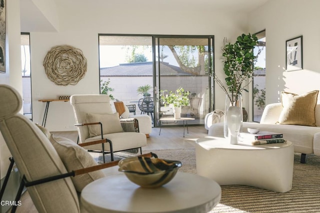 35 Lafayette Dr, Rancho Mirage, CA 92270 - sitting room featuring plenty of natural light and wood finished floors
