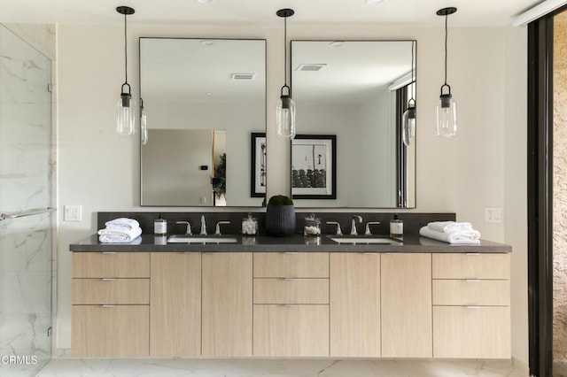 35 Lafayette Dr, Rancho Mirage, CA 92270 - bathroom with marble look tile flooring, double vanity, and a marble finish shower