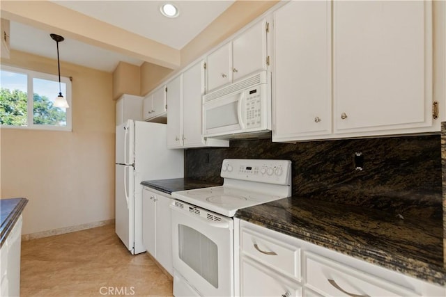 16061 Surprise Ln, Huntington Beach, CA 92649 - kitchen with tasteful backsplash, baseboards, decorative light fixtures, white appliances, and white cabinetry