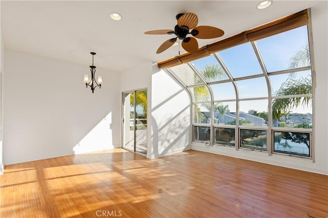 16061 Surprise Ln, Huntington Beach, CA 92649 - unfurnished sunroom with ceiling fan with notable chandelier