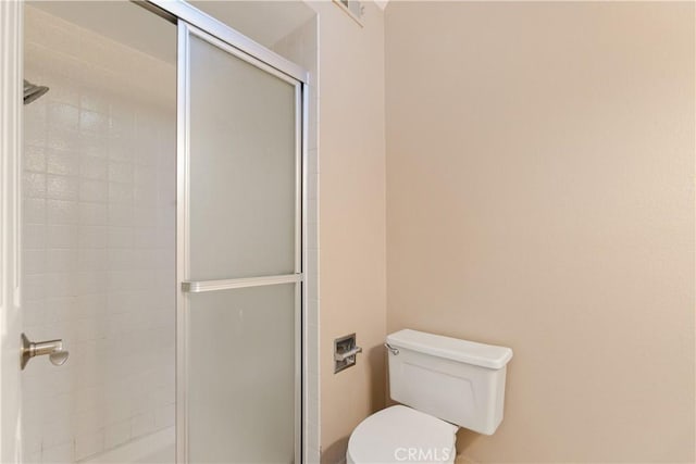 16061 Surprise Ln, Huntington Beach, CA 92649 - bathroom featuring a shower stall and toilet