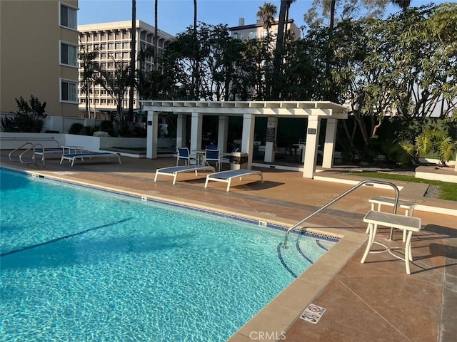 pool featuring a patio