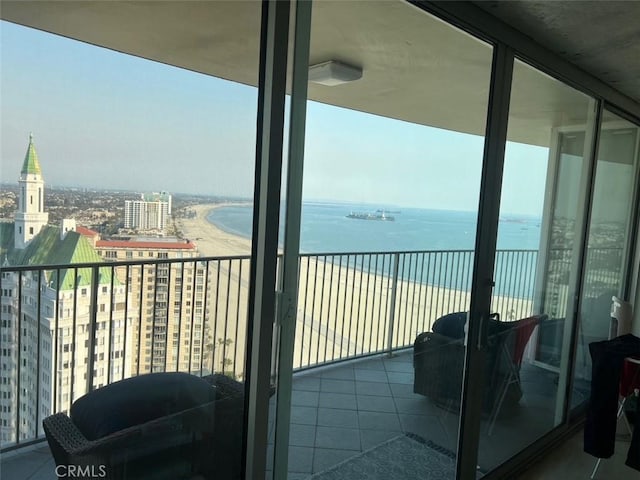 balcony with a city view and a water view