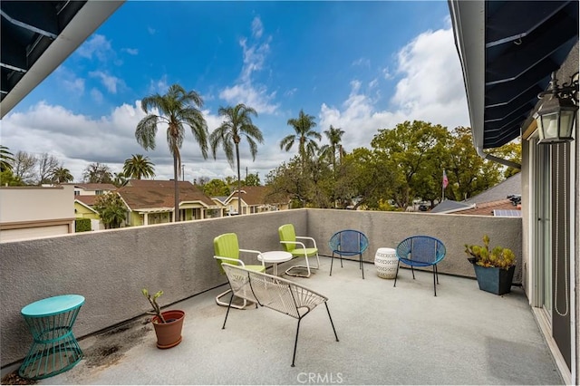 view of patio with a balcony