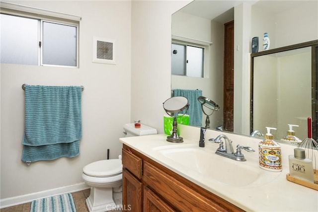 bathroom featuring tile patterned flooring, visible vents, baseboards, toilet, and vanity