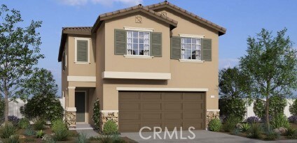 view of front of house featuring a tile roof, a garage, driveway, and stucco siding