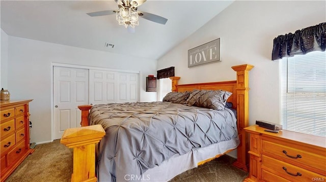 carpeted bedroom featuring a closet, visible vents, a ceiling fan, and lofted ceiling