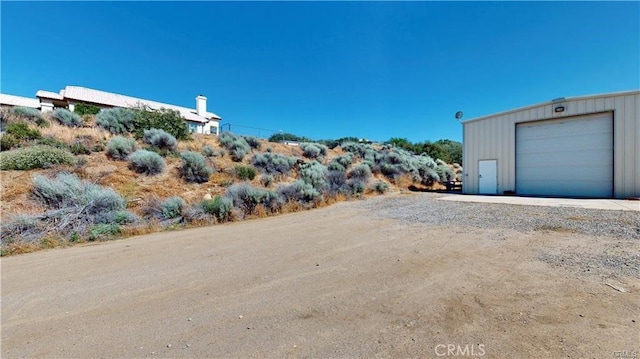 view of detached garage