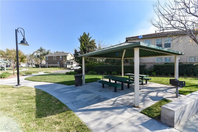 view of community with a gazebo and a yard