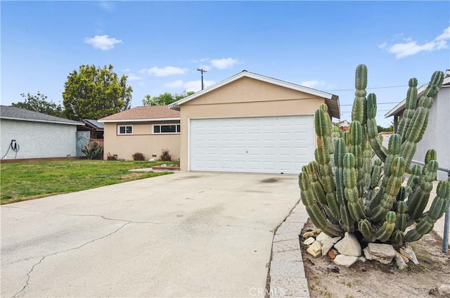 single story home featuring stucco siding, a front lawn, and a garage