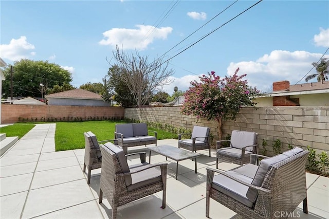 view of patio with an outdoor hangout area and a fenced backyard