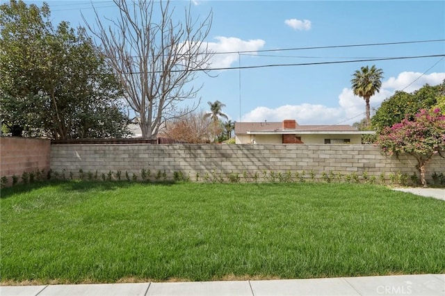 view of yard with fence