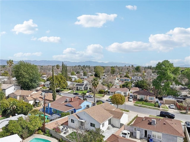 drone / aerial view with a mountain view and a residential view