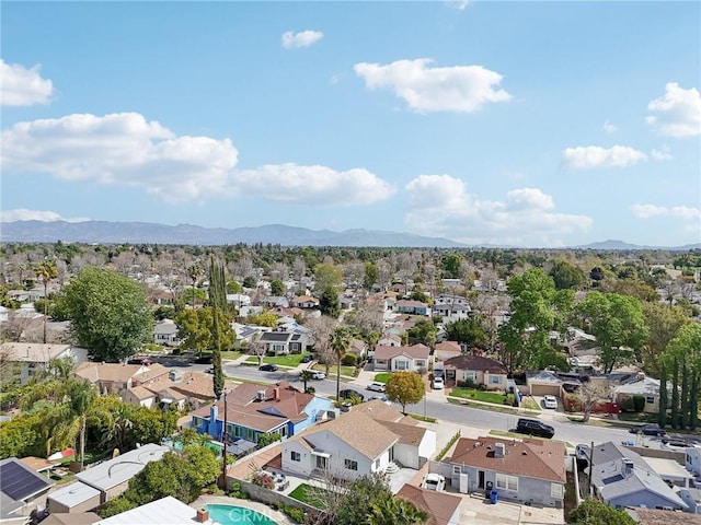 aerial view featuring a mountain view and a residential view