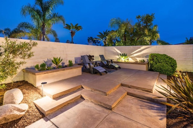 view of patio with a fenced backyard