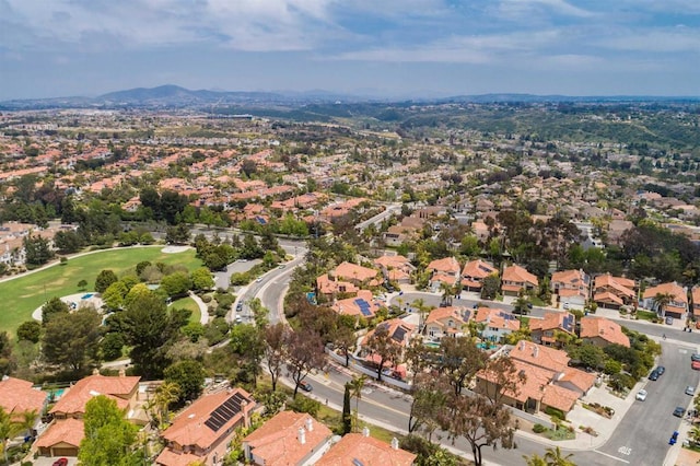 birds eye view of property with a residential view and golf course view