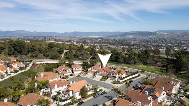 bird's eye view featuring a mountain view and a residential view