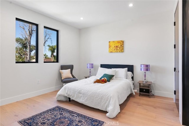 5012 Enfield Ave, Encino, CA 91316 - bedroom with light wood-type flooring and recessed lighting