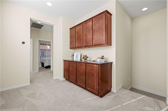 bar with recessed lighting, baseboards, visible vents, and light carpet