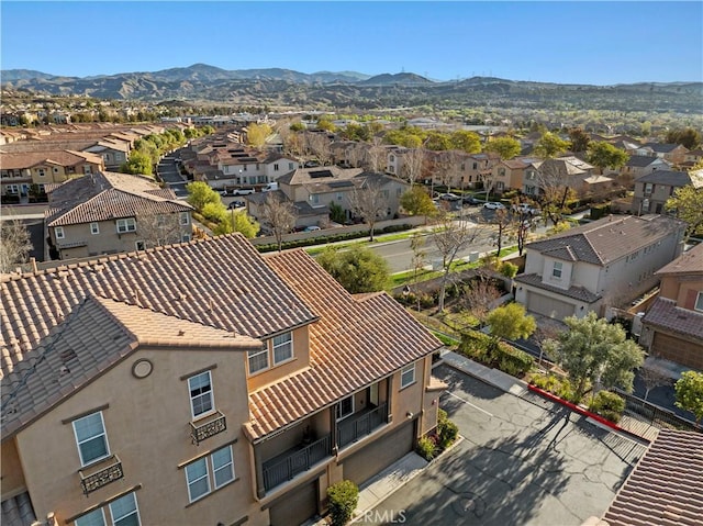 bird's eye view featuring a mountain view and a residential view