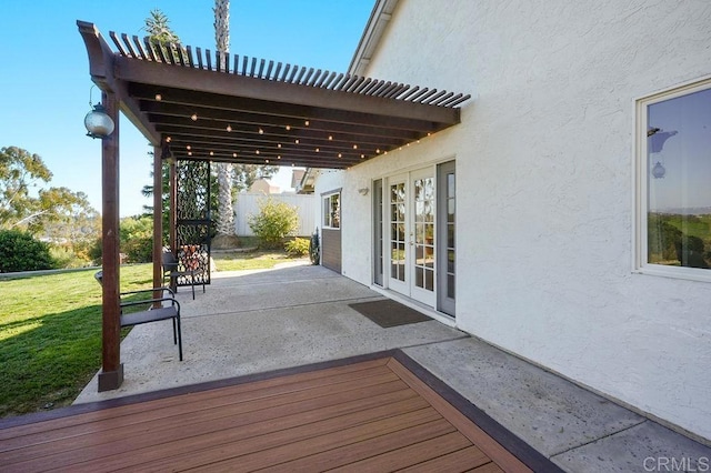 358 Mainsail Rd, Oceanside, CA 92054 - wooden deck with french doors, a lawn, and a patio