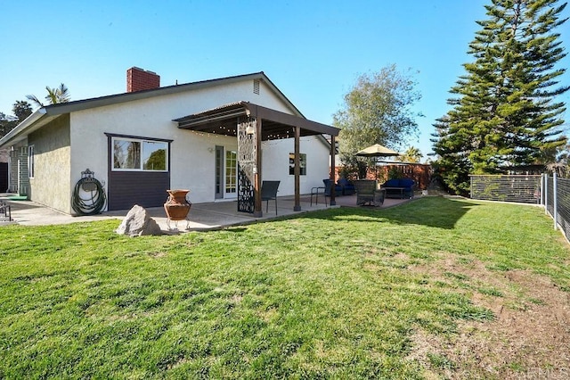 358 Mainsail Rd, Oceanside, CA 92054 - rear view of property with a chimney, stucco siding, a fenced backyard, and a patio