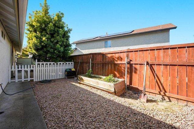 358 Mainsail Rd, Oceanside, CA 92054 - fenced backyard with a vegetable garden