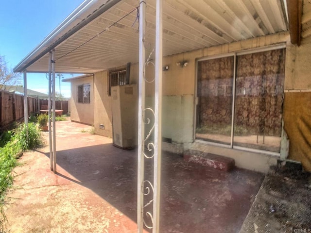 view of patio featuring fence