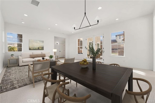 dining area with baseboards, recessed lighting, visible vents, and light carpet