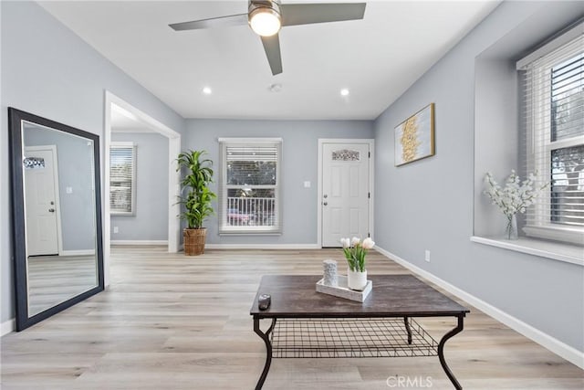 interior space with light wood finished floors and a wealth of natural light