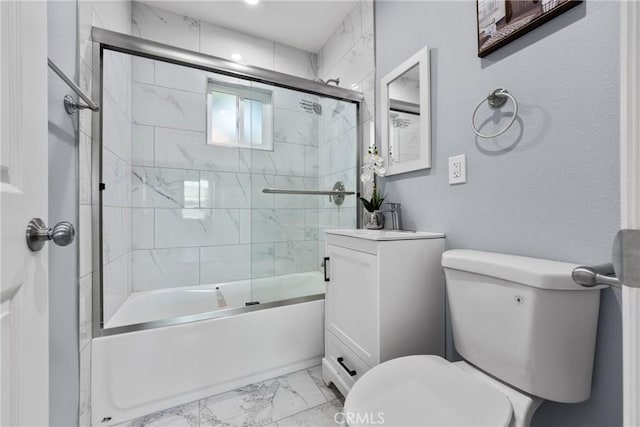 full bathroom featuring enclosed tub / shower combo, marble finish floor, toilet, and vanity