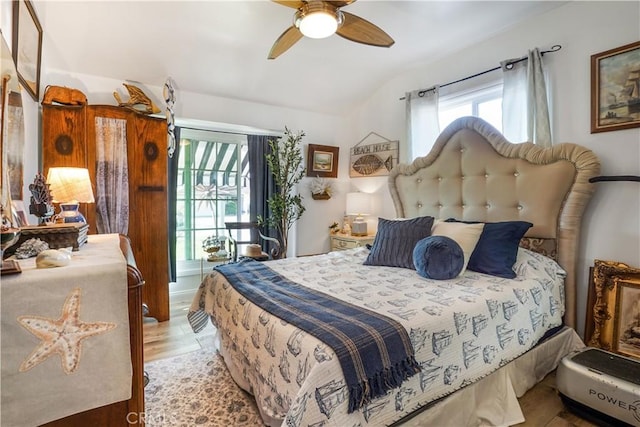 bedroom featuring a ceiling fan and wood finished floors