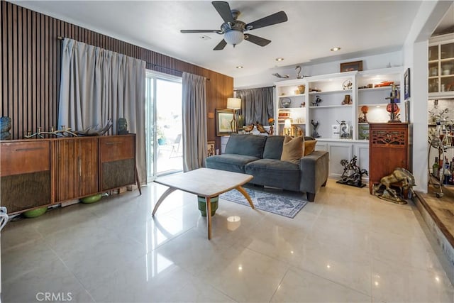 living room with a ceiling fan