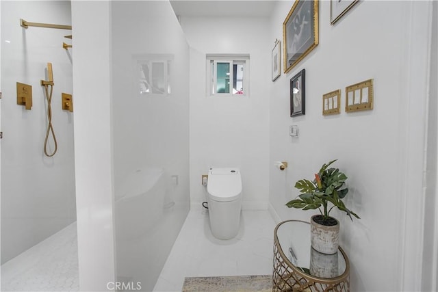 bathroom with toilet and walk in shower