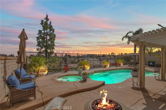 view of pool featuring a fenced in pool, a fenced backyard, an in ground hot tub, a pergola, and a patio