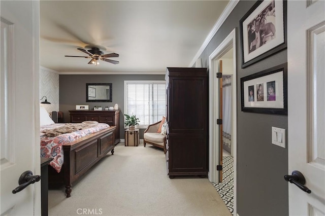 bedroom with a ceiling fan, crown molding, and light colored carpet