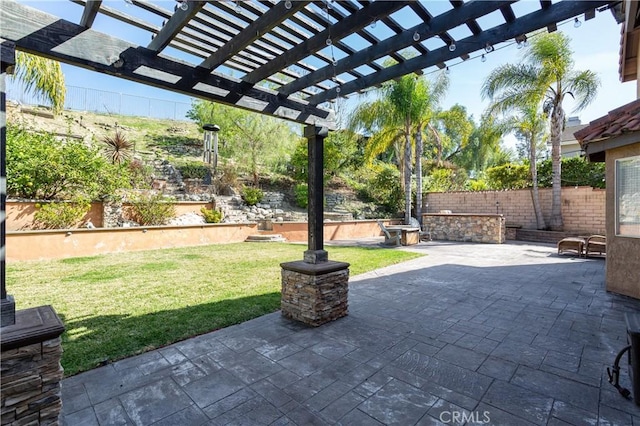 view of patio / terrace with a fenced backyard and a pergola