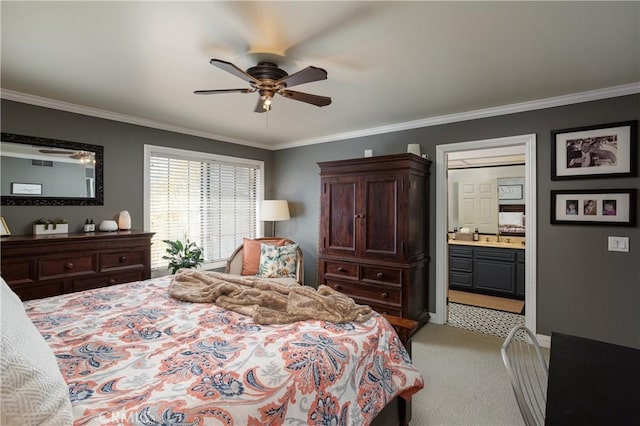 bedroom featuring light carpet, connected bathroom, a ceiling fan, and ornamental molding