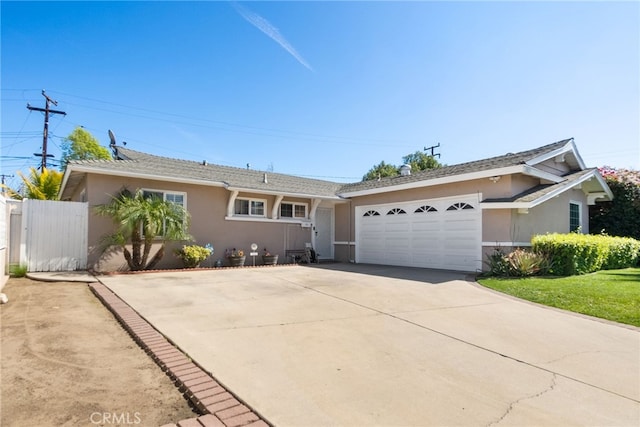 ranch-style home with concrete driveway, fence, a garage, and stucco siding