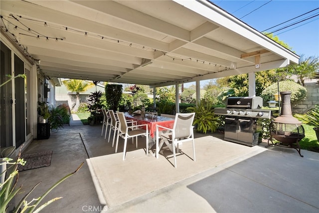 view of patio / terrace featuring grilling area and outdoor dining area