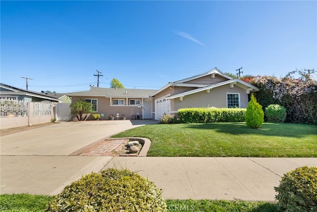 ranch-style home featuring a front yard, fence, an attached garage, stucco siding, and concrete driveway