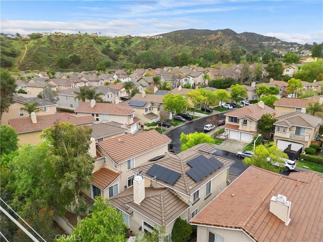birds eye view of property with a residential view and a mountain view