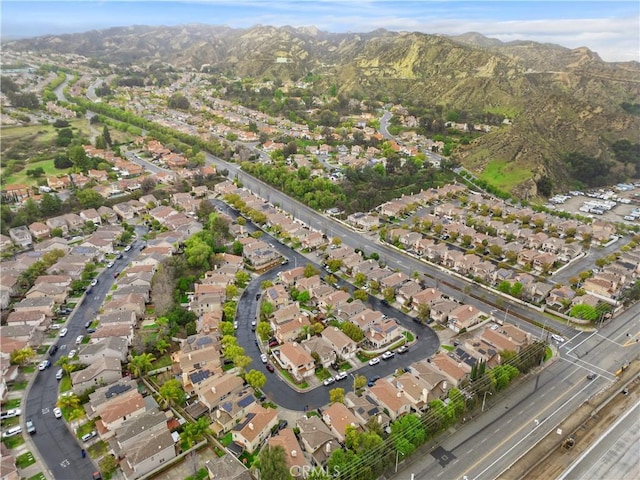 aerial view with a mountain view and a residential view